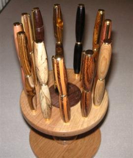 A set of pens in holder by Bernard Slingsby